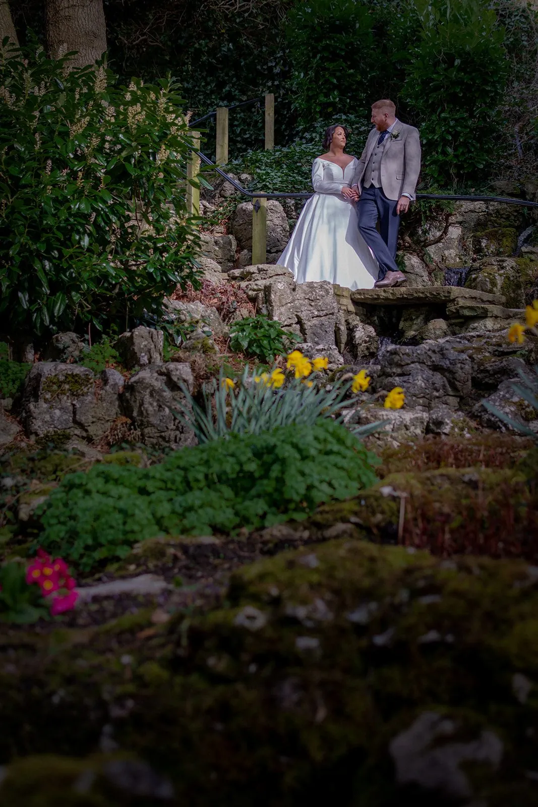 Couple among spring planting, the sort of detail a converted farm's garden gives you in April and May